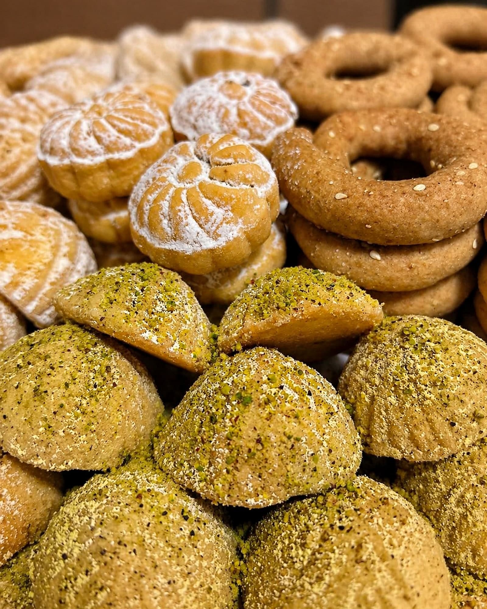 Hand-stamped Alhana cookies — date maamoul, kaak, and pistachio domes